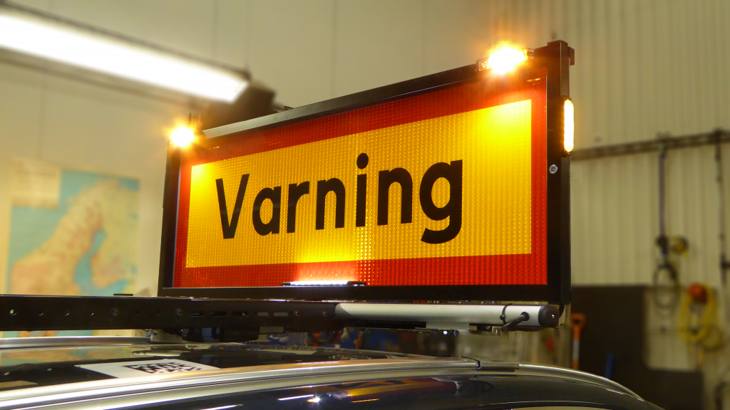 Volvo VC60 följebil, varningsskylt